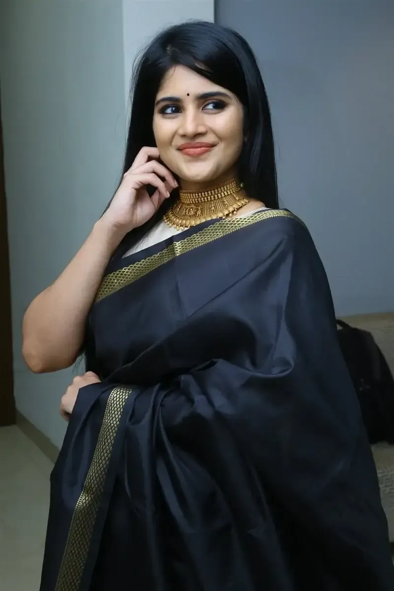 Megha Akash in Black Saree at Manu Charitra Telugu Movie Trailer Launch